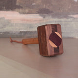 Hammer style bottle opener and phone holder